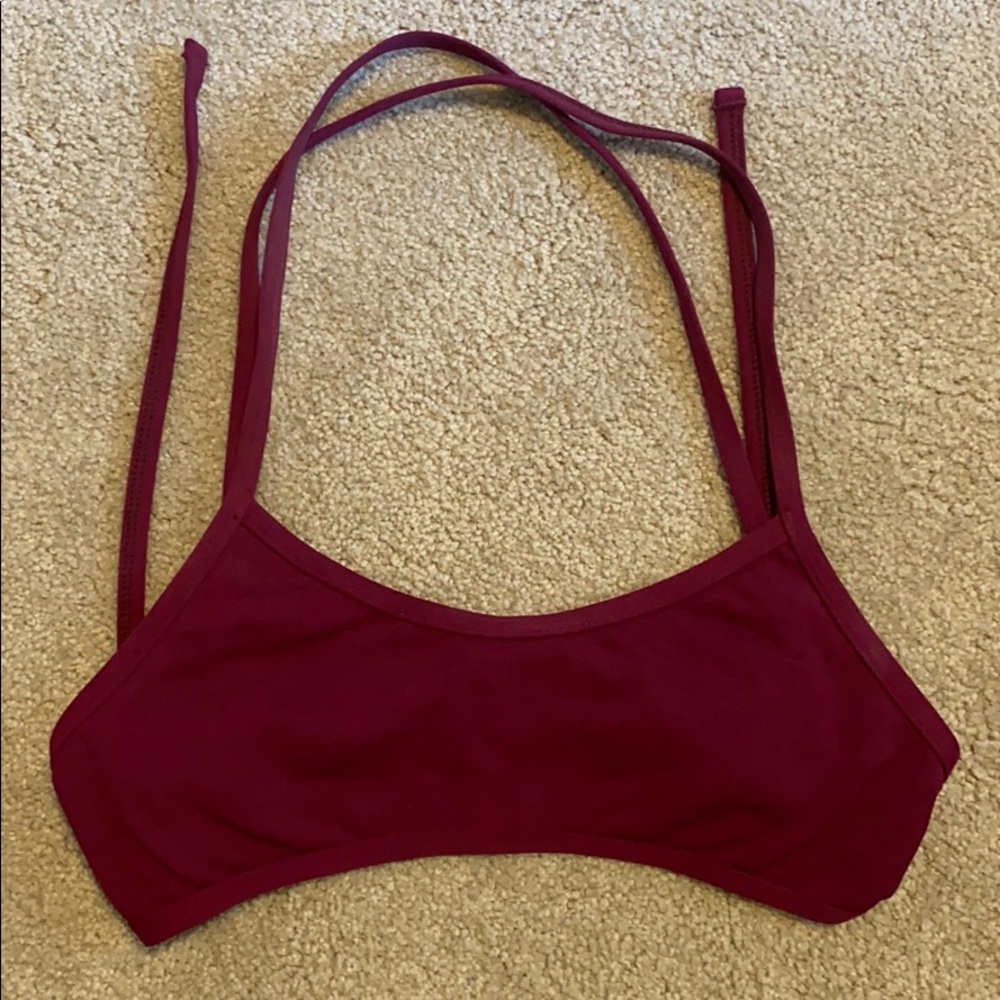 Jolyn maroon swim top.